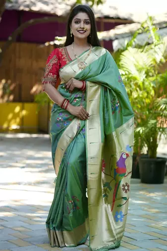 Green woven design zari paithani saree