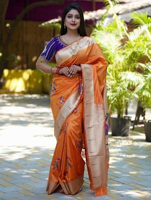 Orange woven design zari paithani saree 1