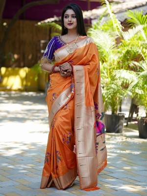 Orange woven design zari paithani saree 4