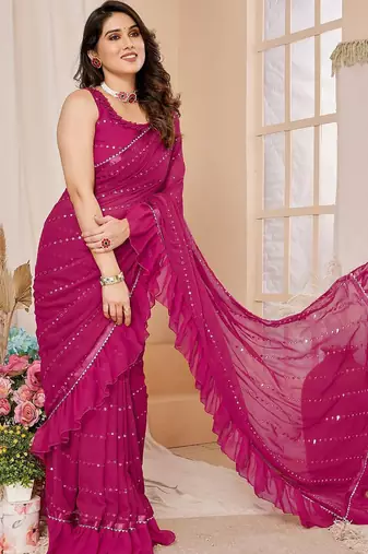 Pink embroidered mirror work ruffles saree with unstitched blouse piece