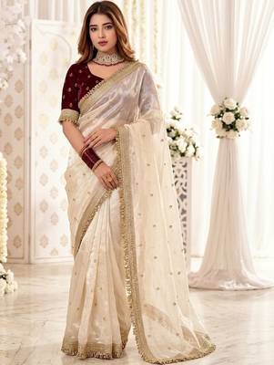 Off white embellished zari satin heavy work saree 1