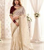 Off white embellished zari satin heavy work saree