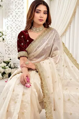Off white embellished zari satin heavy work saree