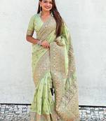 Green woven design pashmina saree with unstitched blouse piece