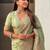 Green woven design pashmina saree with unstitched blouse piece