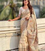 Beige woven design saree