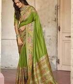 Green embellished zari saree