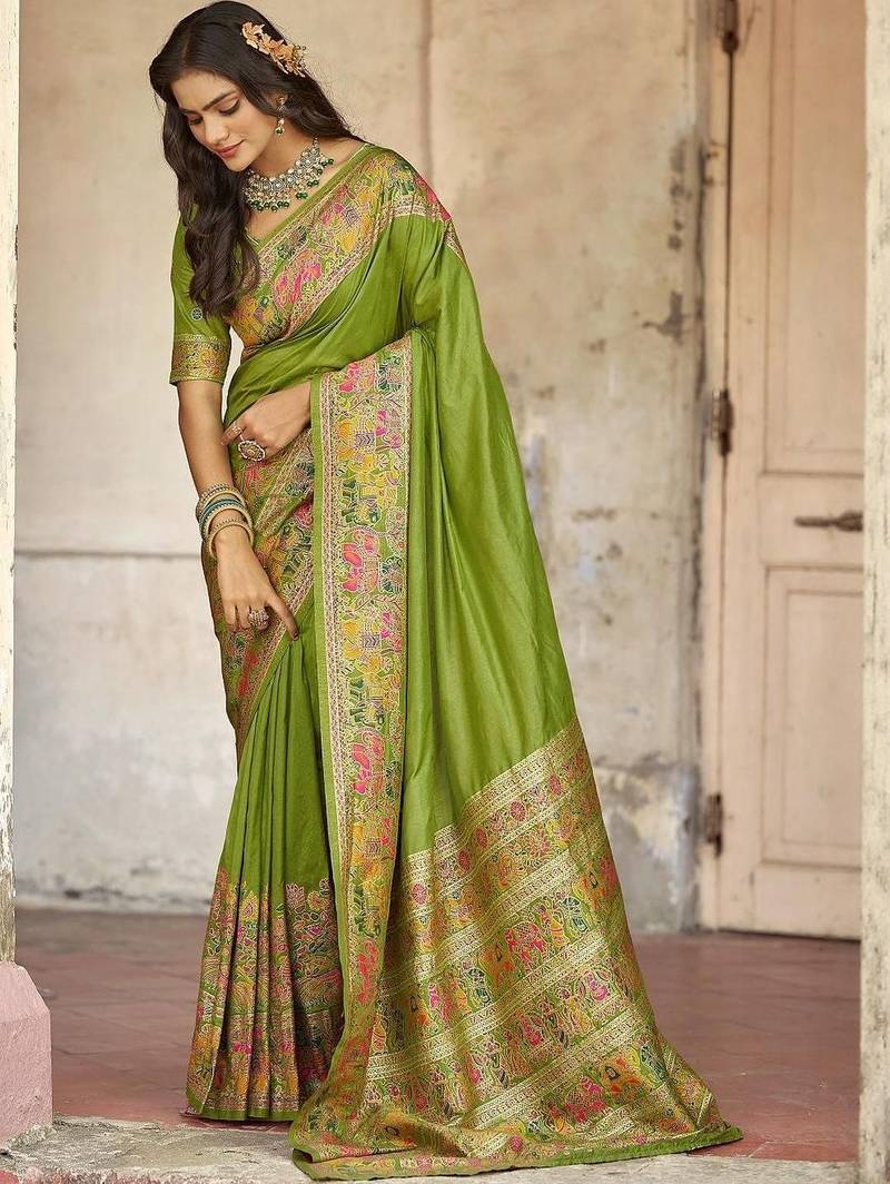 Green embellished zari saree