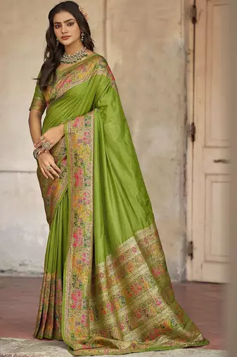 Green embellished zari saree