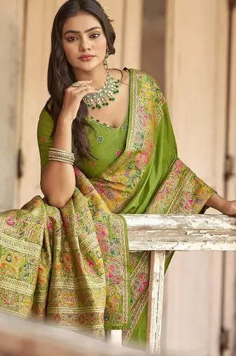 Green embellished zari saree