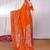Orange embellished zari saree
