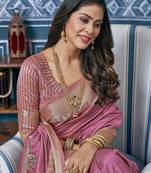 Pink ethnic motif embroidered zari woven saree