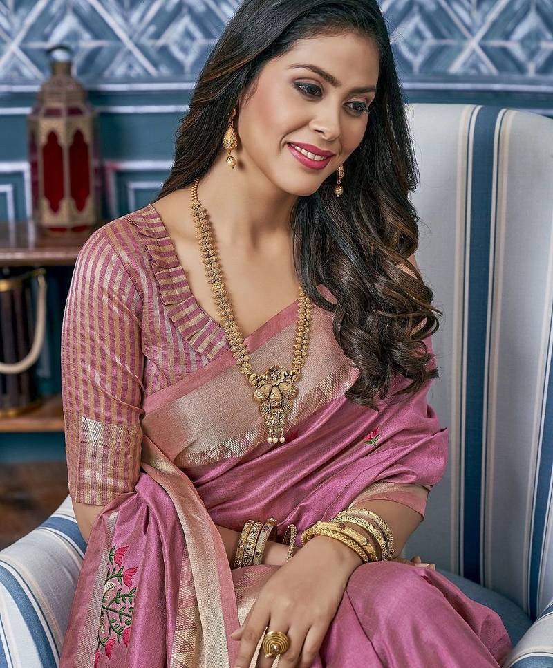 Pink ethnic motif embroidered zari woven saree