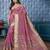 Pink ethnic motif embroidered zari woven saree