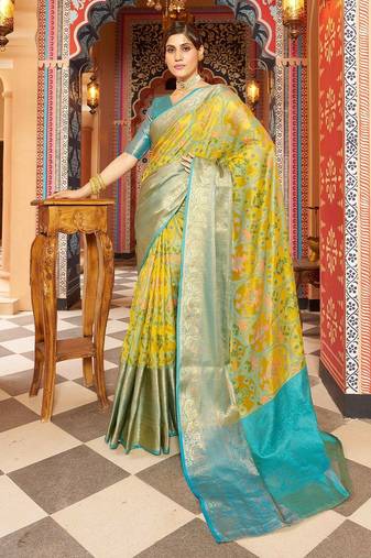 Yellow ethnic woven design zari pure cotton saree