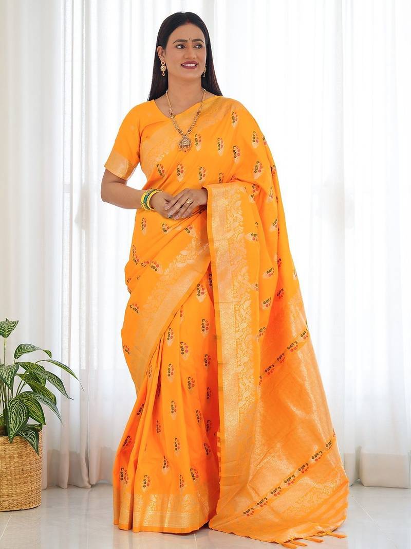 Yellow ethnic motifs woven design zari banarasi saree