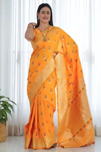 Yellow ethnic motifs woven design zari banarasi saree
