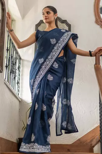Blue floral kutchi embroidery muga saree