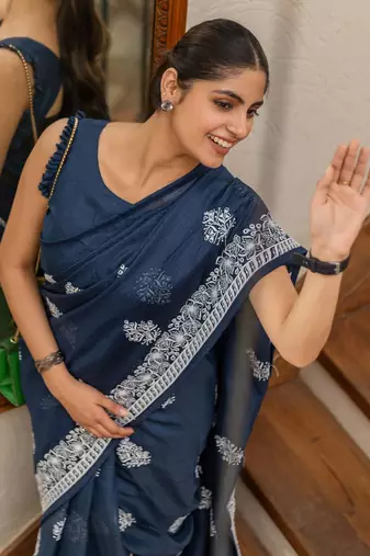 Blue floral kutchi embroidery muga saree