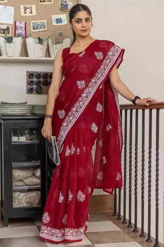 Red floral kutchi embroidery muga saree