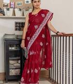 Red floral kutchi embroidery muga saree