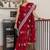 Red floral kutchi embroidery muga saree