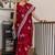 Red floral kutchi embroidery muga saree