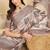 Beige geometric printed silk blend tussar saree