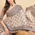 Beige floral printed tussar saree