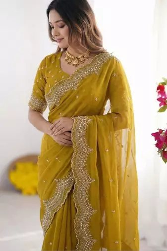 Yellow embellished beads and stones poly georgette heavy work saree
