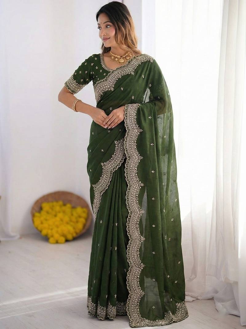 Green embellished embroidered poly georgette heavy work saree