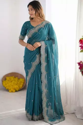 Teal embroidered poly georgette designer saree