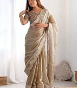 Beige ethnic motifs sequinned organza heavy work saree