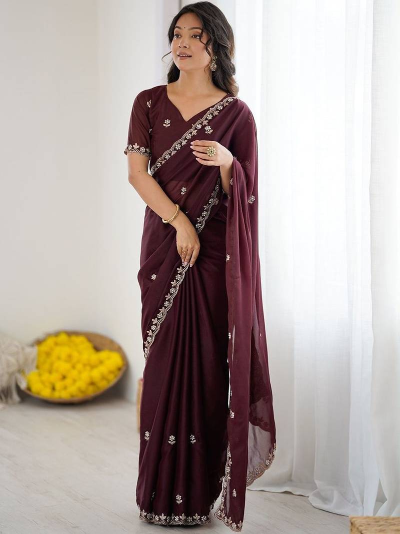 Maroon embellished embroidered pure georgette heavy work saree