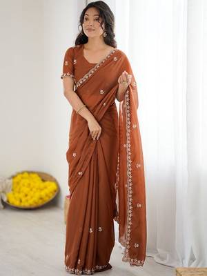 Rust embellished embroidered pure georgette heavy work saree 3