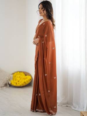 Rust embellished embroidered pure georgette heavy work saree 4