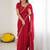 Red ethnic motifs embroidered pure georgette heavy work saree