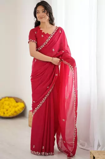 Red ethnic motifs embroidered pure georgette heavy work saree