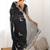 Black embellished sequinned organza heavy work saree