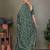 Green ethnic motifs saree