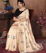Cream floral embroidered organza saree