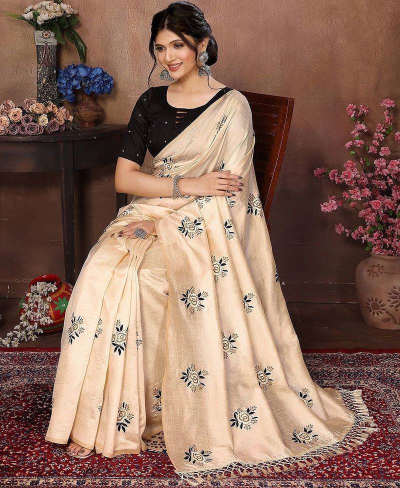 Cream floral embroidered organza saree
