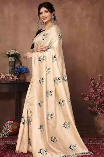 Cream floral embroidered organza saree