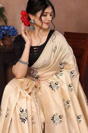 Cream floral embroidered organza saree