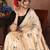 Cream floral embroidered organza saree