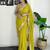 Lime floral embroidered sequinned scallop border saree