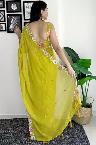 Lime floral embroidered sequinned scallop border saree