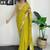 Lime floral embroidered sequinned scallop border saree