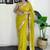 Lime floral embroidered sequinned scallop border saree