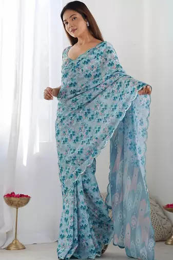 Blue ethnic motifs sequinned pure chiffon ikat saree